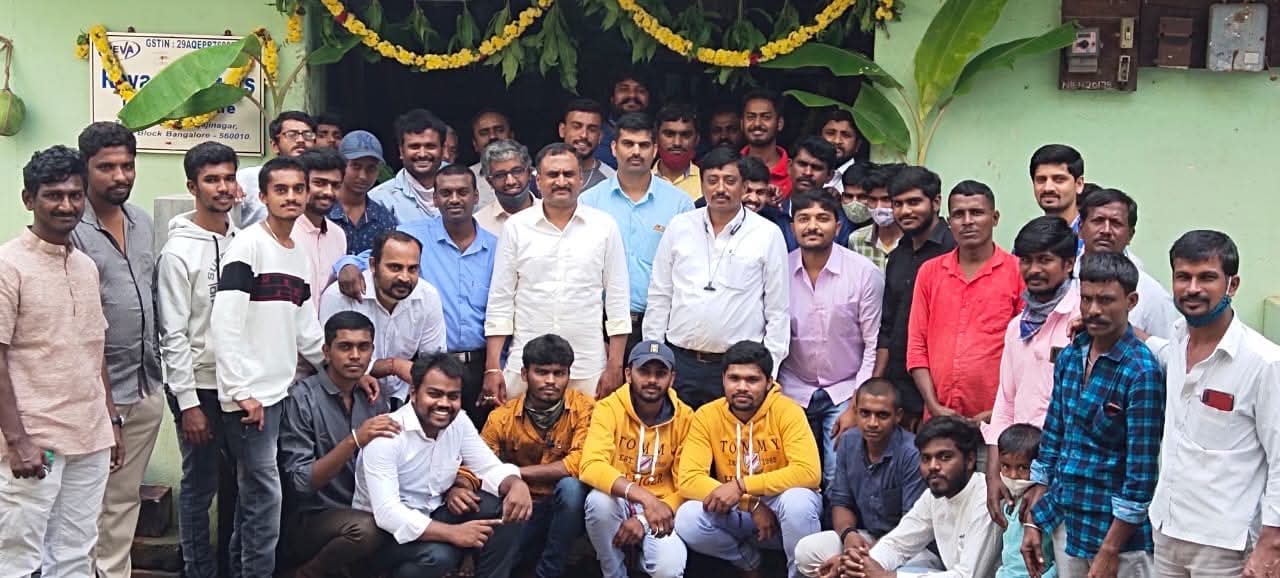 Mr Rudrappa with the Reva Elevators team