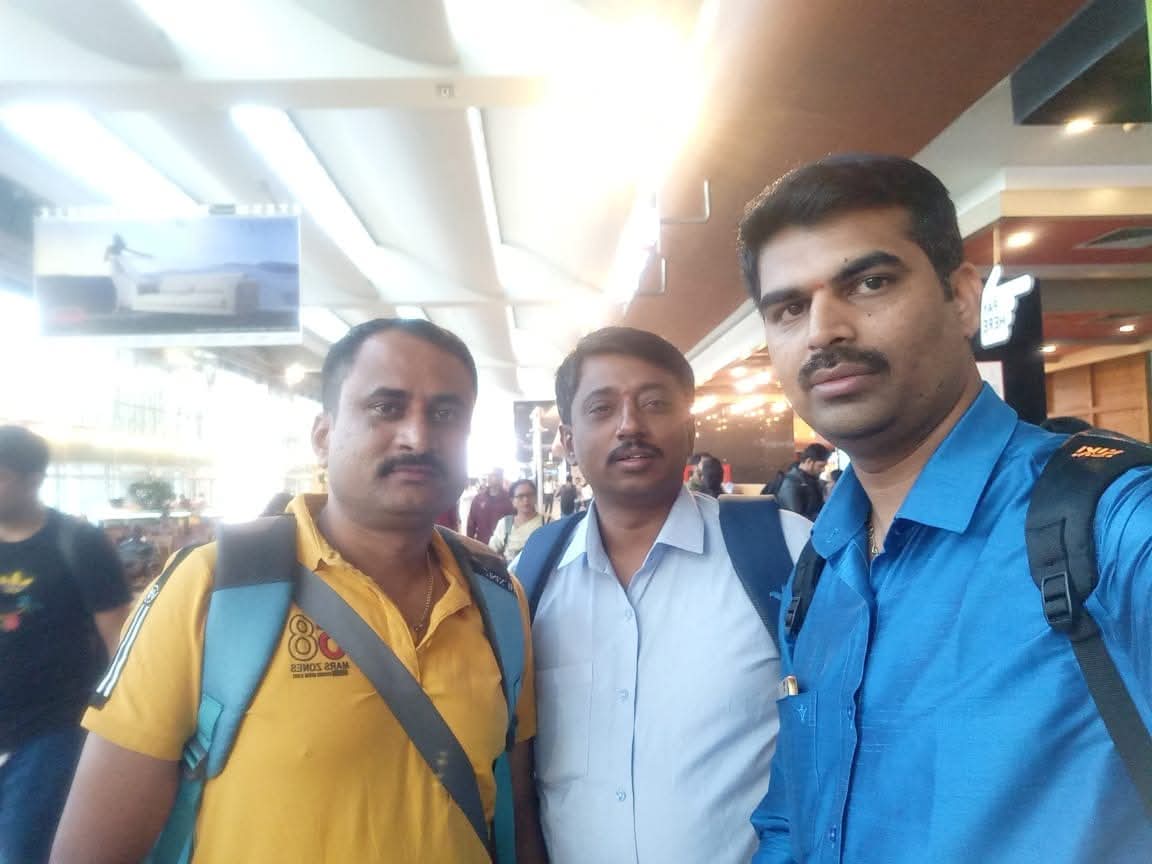Mr Rudrappa with his partners at Reva Elevators